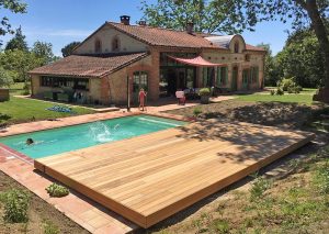 terrasse mobile coulissante sur la longueur pour une batisse toulousaine en pierre
