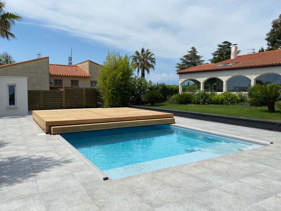 Terrasse mobile 2 plateaux en tiroir ou gigogne. Un plateau glisse sous l'autre pour découvrir la piscine